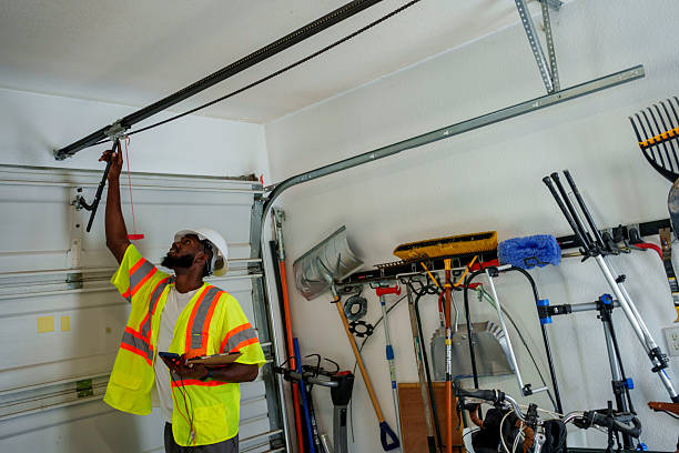 Professional Garage Door Panel Replacement technician working in Clara City, MN